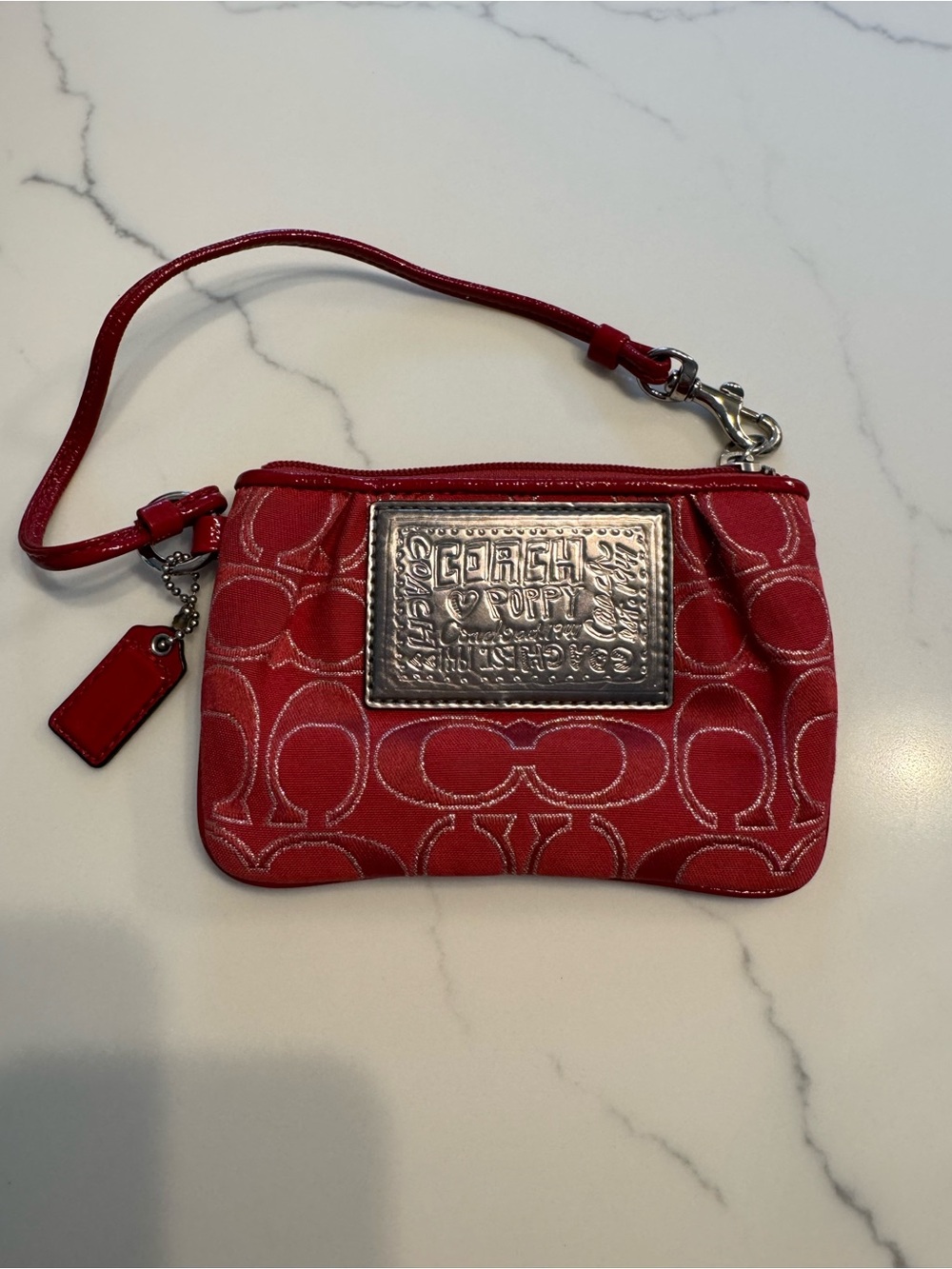Coach Poppy Red Signature Wristlet with Silver Logo Plaque. Never used.